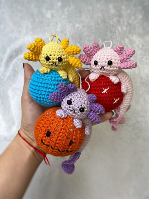 Christmas axolotl ornament on the ball