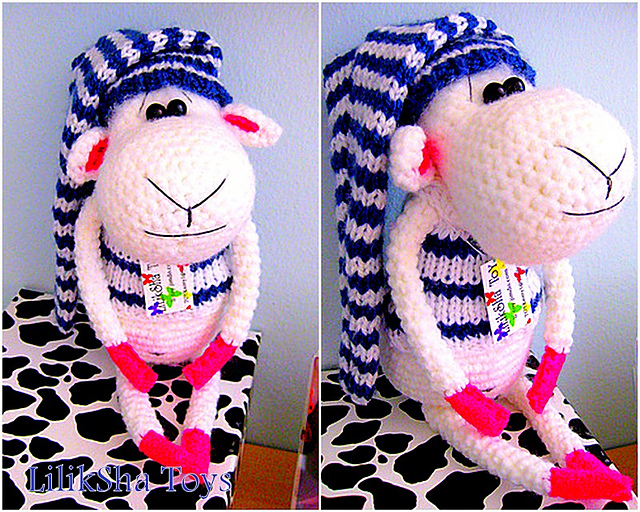 Moo the Sheep in a sweater and a cap