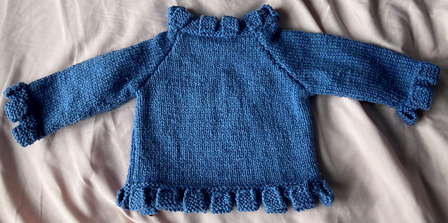 Jean Genie button flap sweater