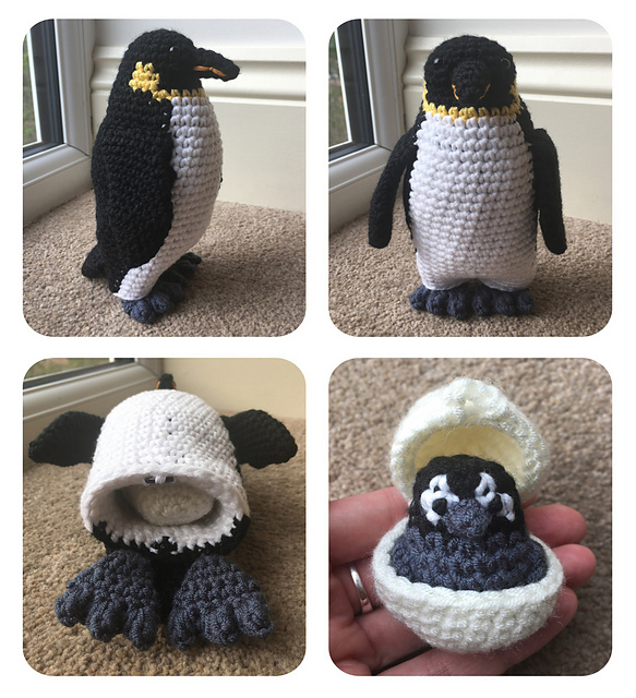 Laying Emperor Penguin with Chick
