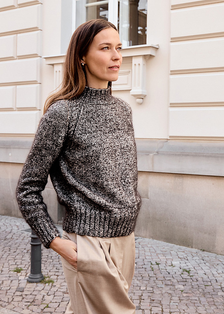 # 14 Raglanpullover mit Zopf