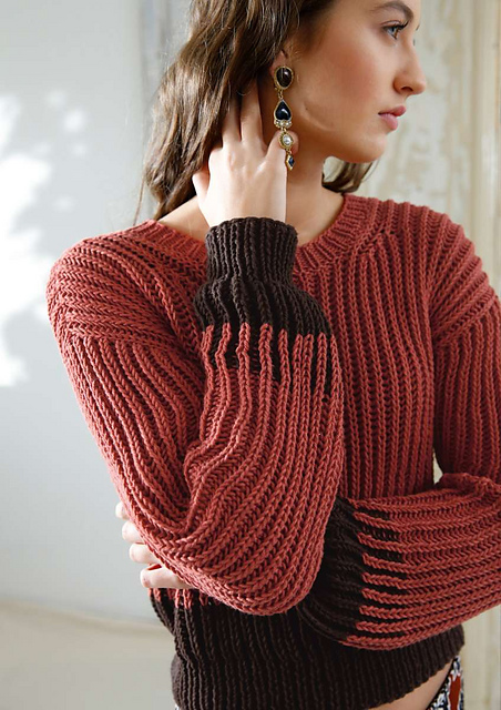 # 27 Zweifarbiger Patentpulli