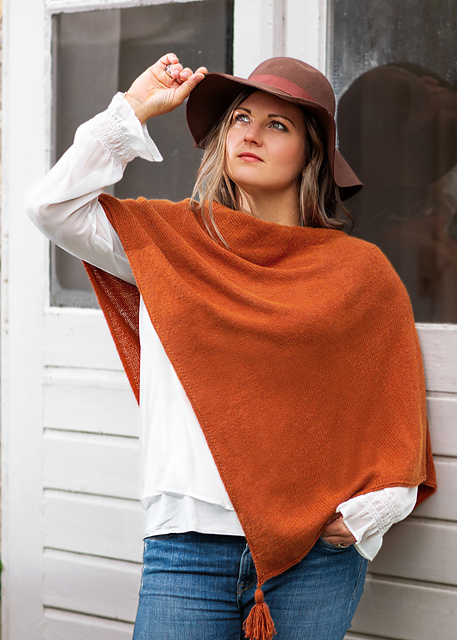 # 20 Poncho mit Quasten