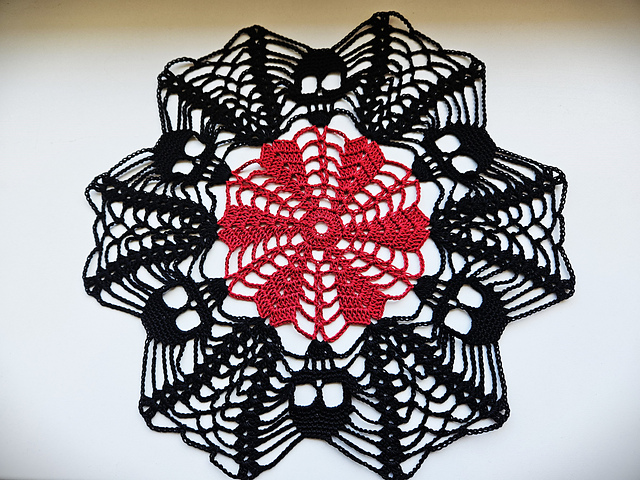 Entrapped skulls doily