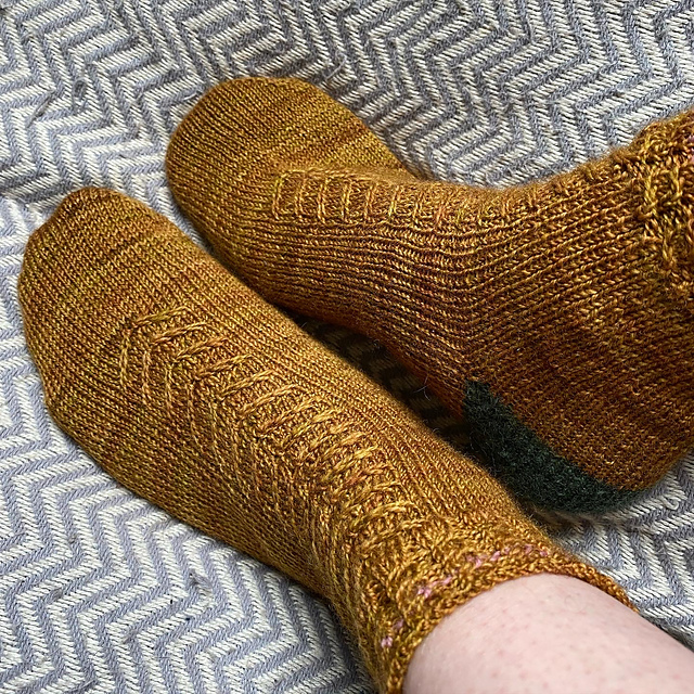 Ravelry: Bird of Prey Socks pattern by Meridittle Makes