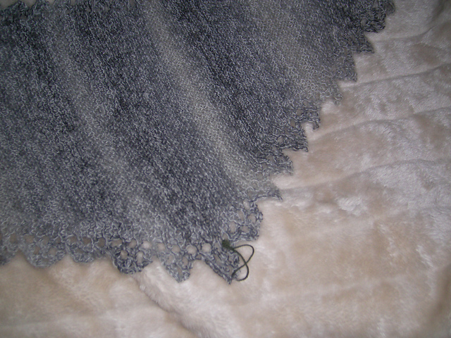 A sideways knitted shawl