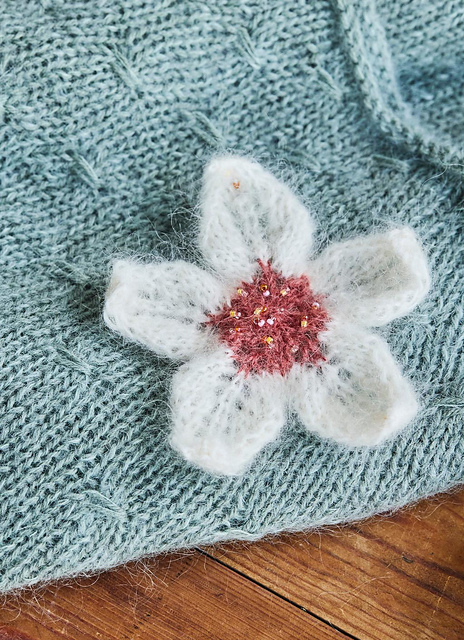 Knitted flower brooch