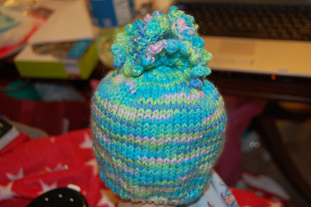 Pebbles Flower Top Hat