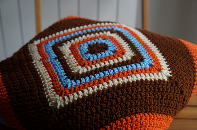 Solid granny square pillow