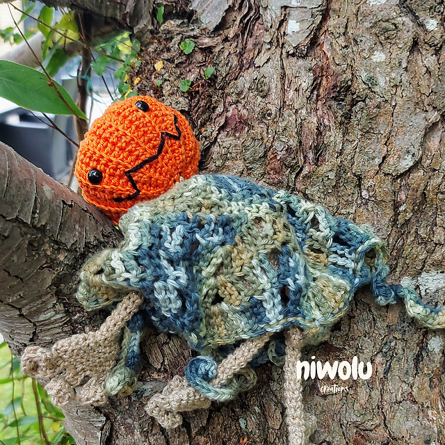 Pumpkin-head scarecrow