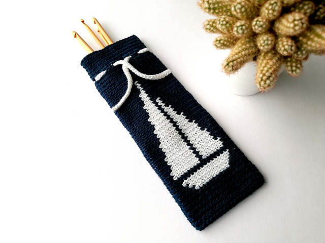 Drawstring bag with a sailboat