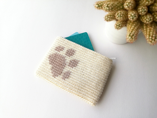 Zipper pouch with a paw print