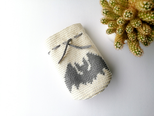 Drawstring bag with a bat