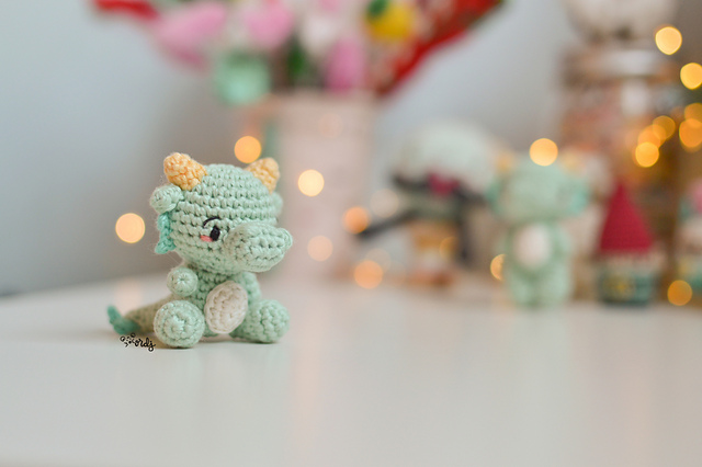 Mini dragón y Daruma