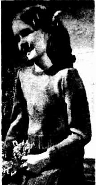 A Jumper with Her Own Initials on the Sleeve