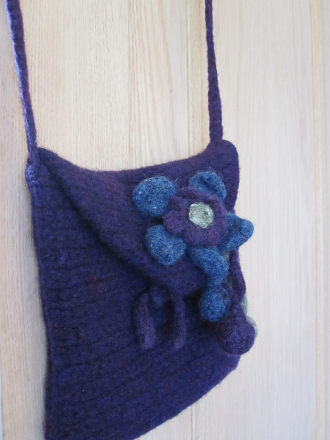 Felted bag with corsage