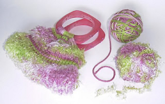 Knit purse with bangle bracelets handle