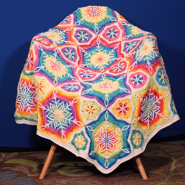 Ravelry Rainbow Snowflake Blanket pattern by Jane Zane