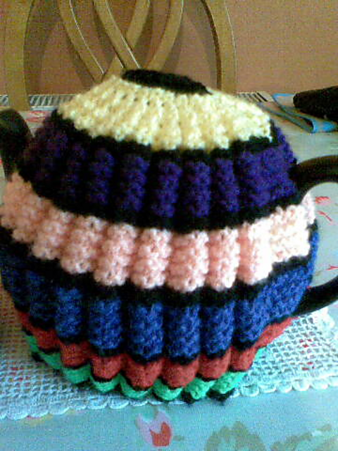 Five stripy tea cosies