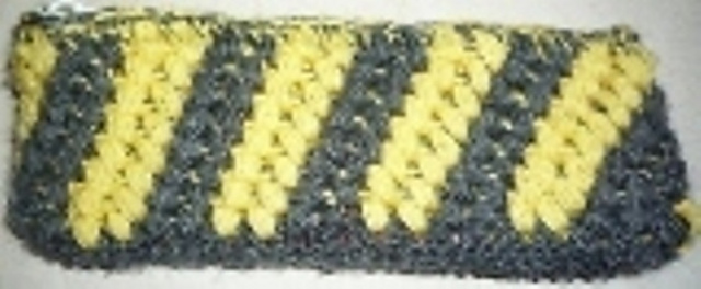 puff stitch cross design pencil case