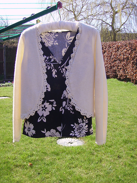 Bolero with curved lower fronts