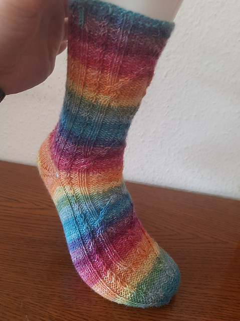 Regenbogen-Zöpfe