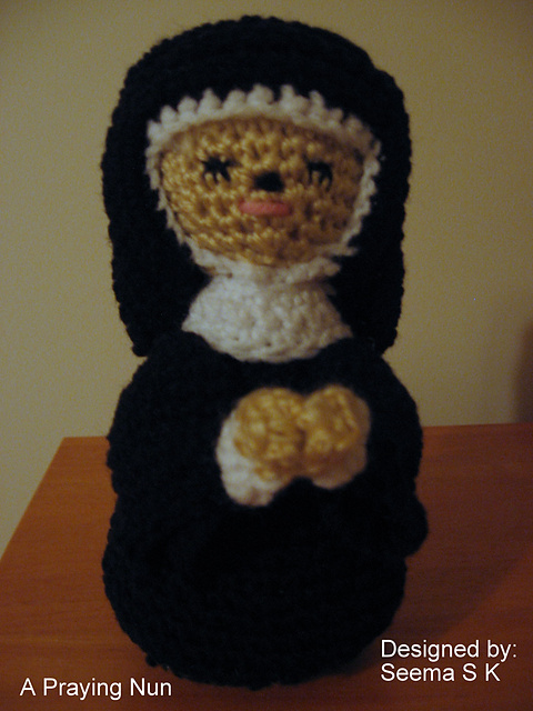 A praying Nun
