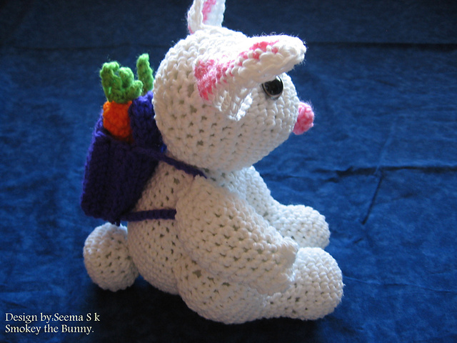 Smokey the Bunny with bacpack full of carrots