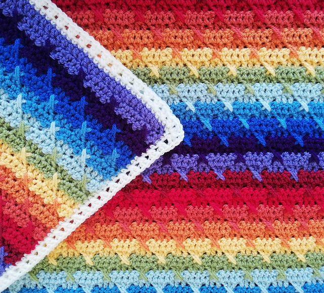 Ravelry Rainbow Kisses Blanket pattern by Helen McLean