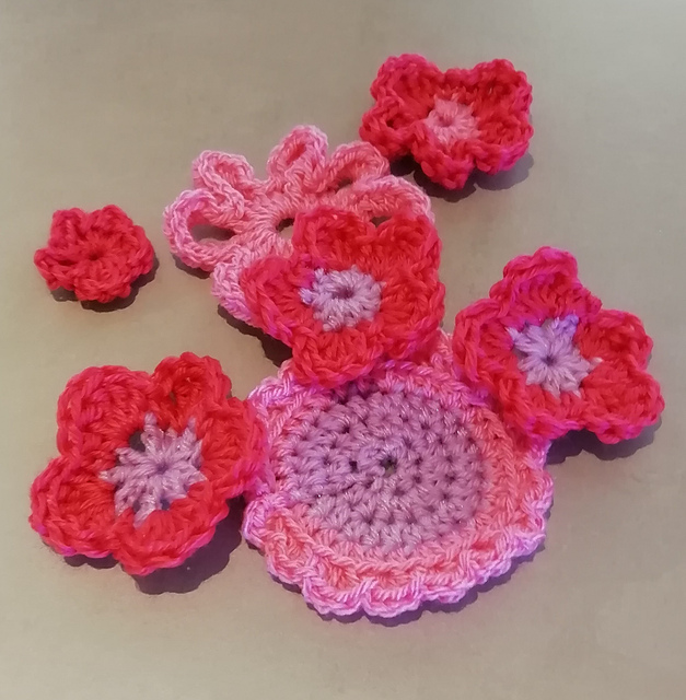 9 Flower Motifs and a Leaf