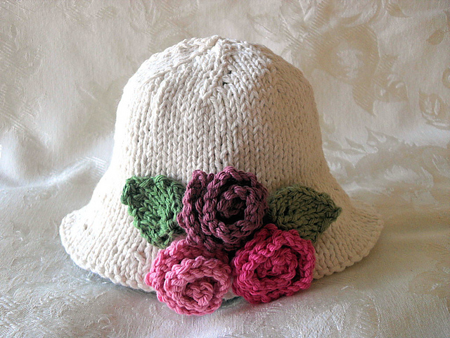 Three Roses Brimmed hat in jewel toned colors