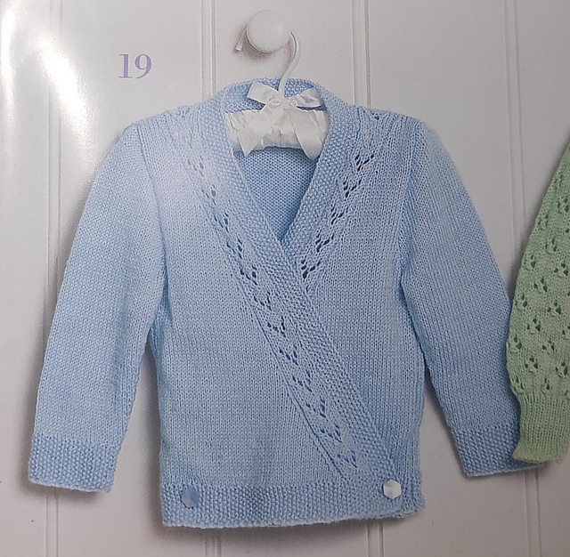19. Cross over cardigan with lace insert