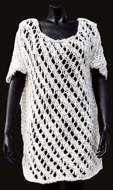 Bulky tunic with "wings"