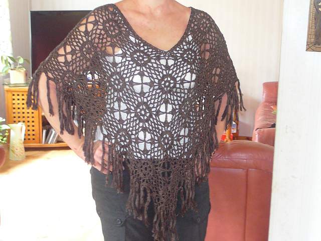 # 11 Dark brown crochet poncho