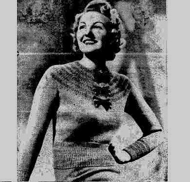 With a Becoming High Neckline