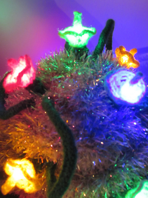 Christmas tinsel and fairy lights tea cosy
