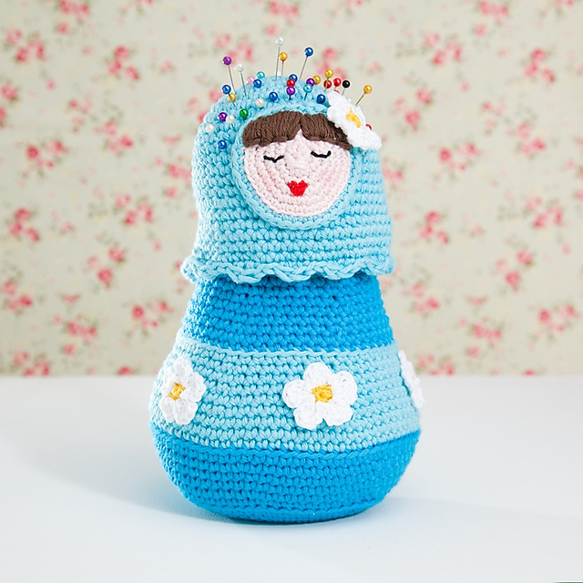 Matroesjka storage doll with pincushion head.
