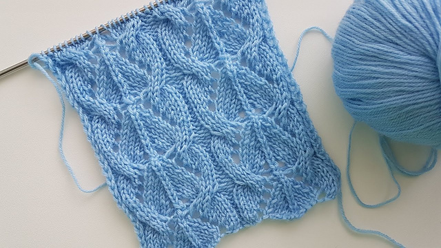 Blue cable baby blanket square