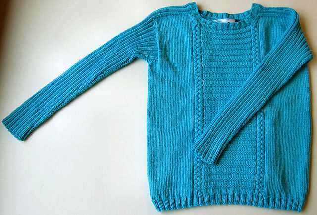 Modell 4 Musterpulli in türkis