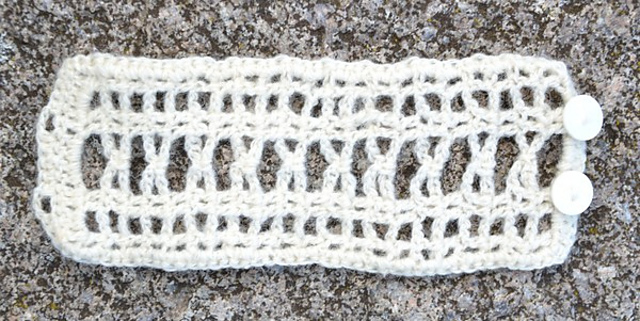 Cuffs with X-pattern/Pulsvärmare med X-mönster