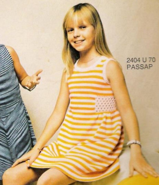 2404 Child's dress with open work trimming