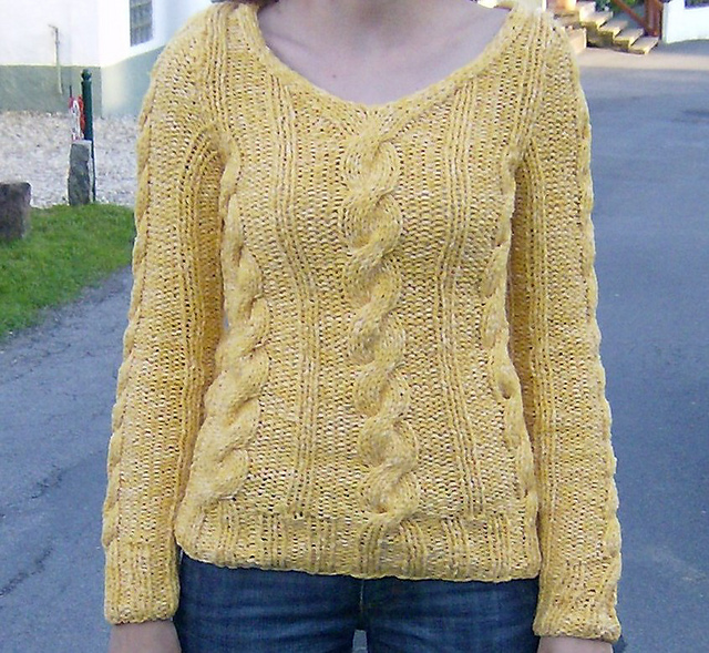 13 Pullover mit Zöpfen