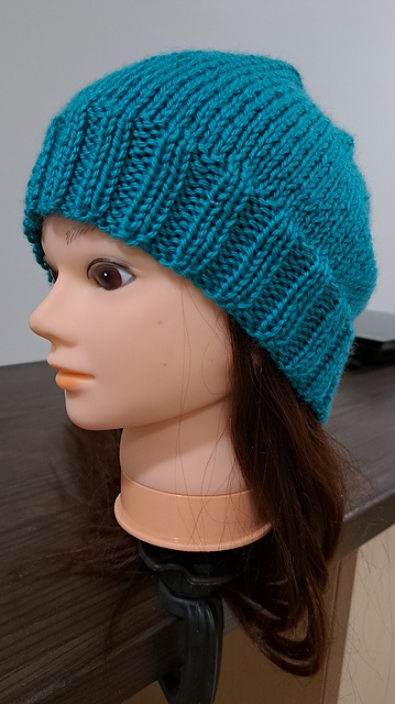 Knit beanie on two straight needles