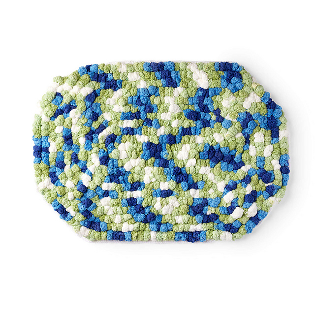 Trendy Oval Pompom Rug