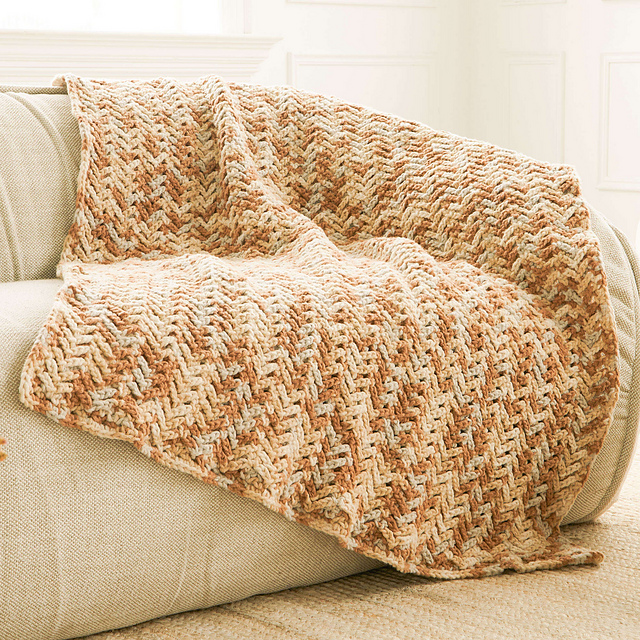 Ravelry Fleecy Herringbone Blanket pattern by Yarnspirations Design Studio