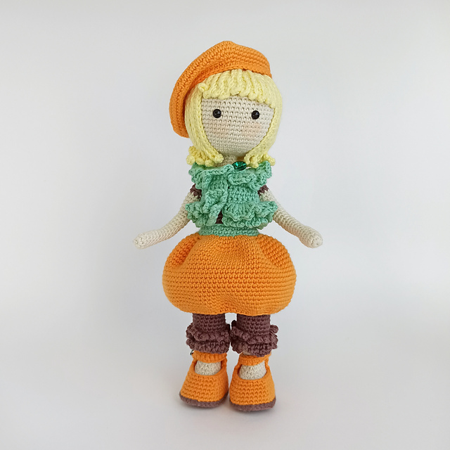 orange pumpkin doll