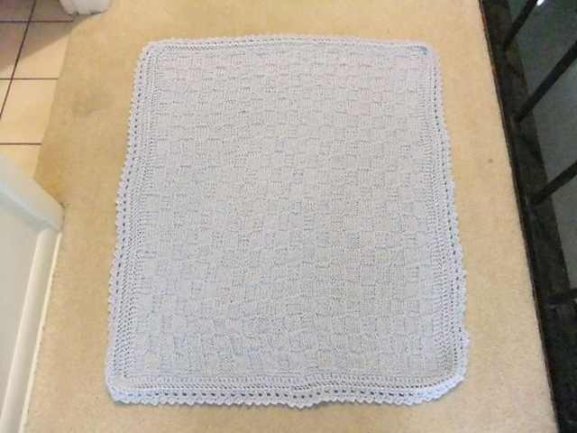 A Simple Baby Blanket with Knit-on Lace Edging