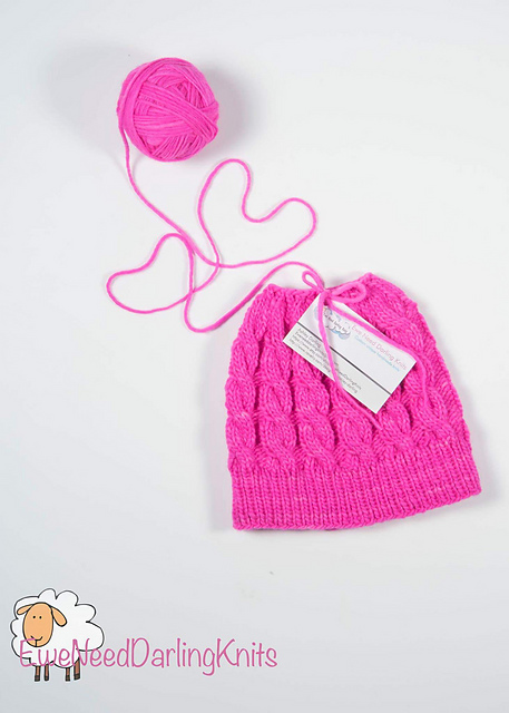 Darling Little Cabled Bun Hat