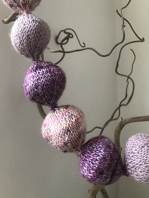 Happy baubles on a string