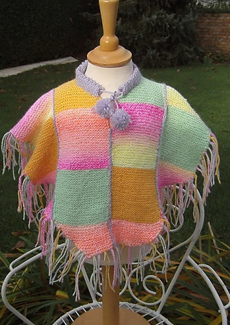 Geblokte poncho 1 en 2